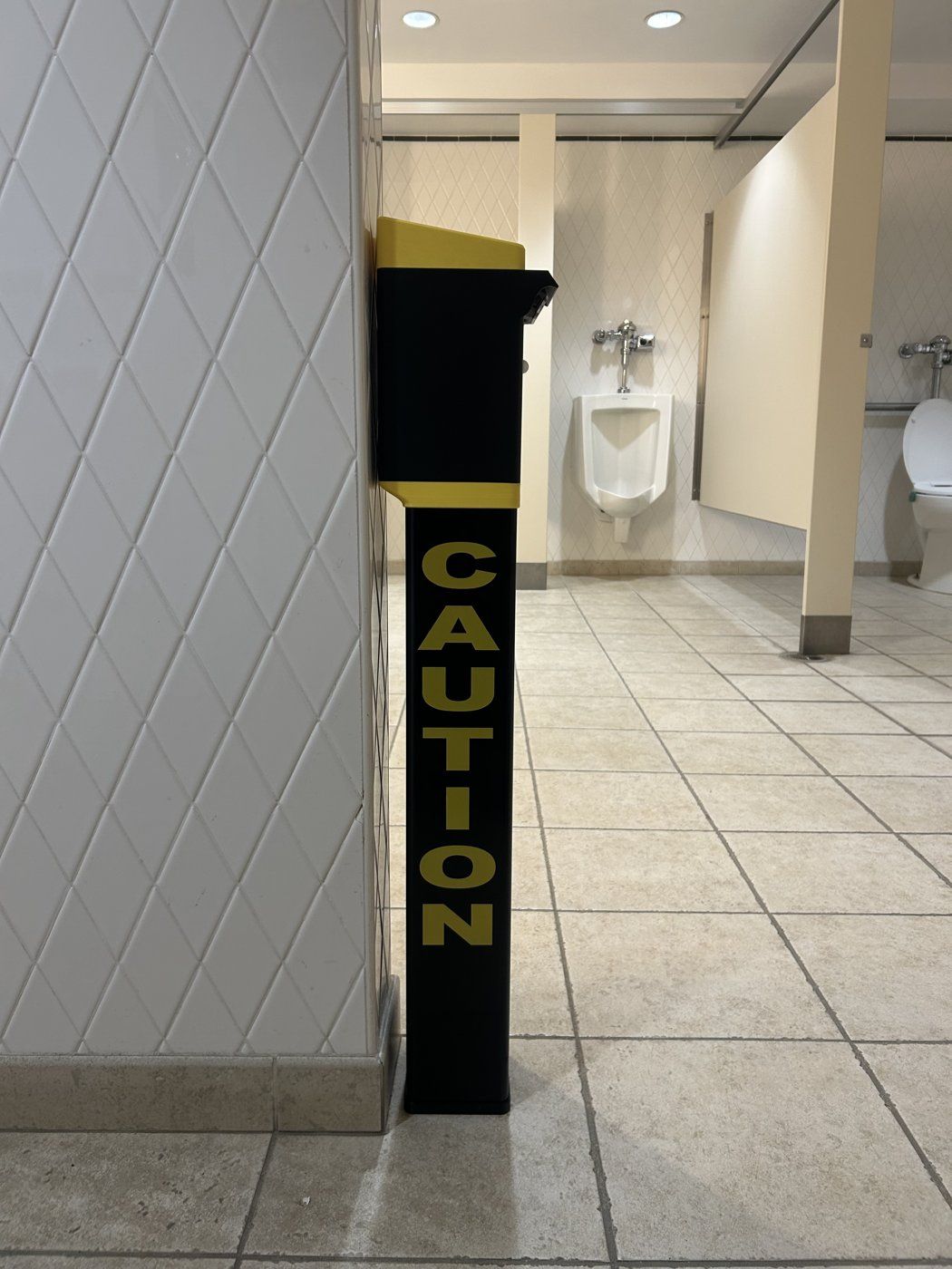 Safety Illuminator Wall Mount Model on a restroom wall